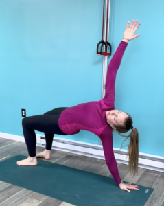 Chloe demonstrating twisting bears which helps stabilize spine mobility