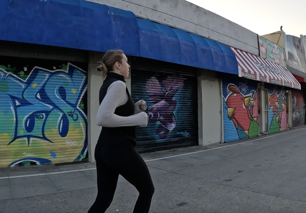 Chloe running in Santa Monica CA. She is recovering fully from her calf injury recovery