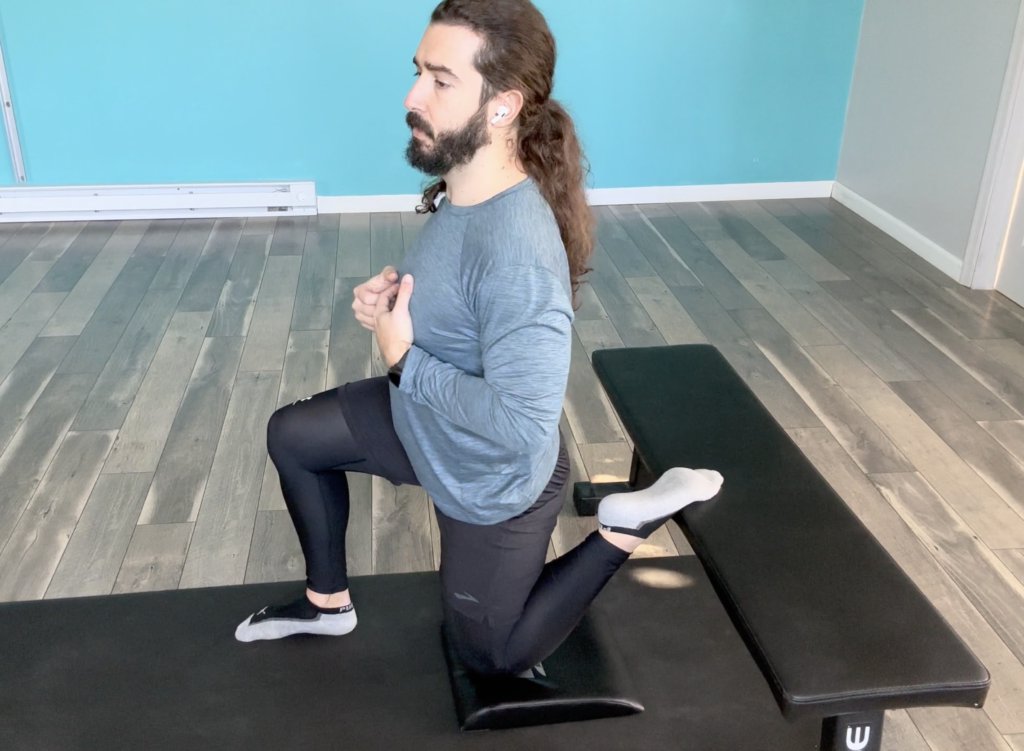 John doing the couch stretch as a corrective exercise from the inline lunge test