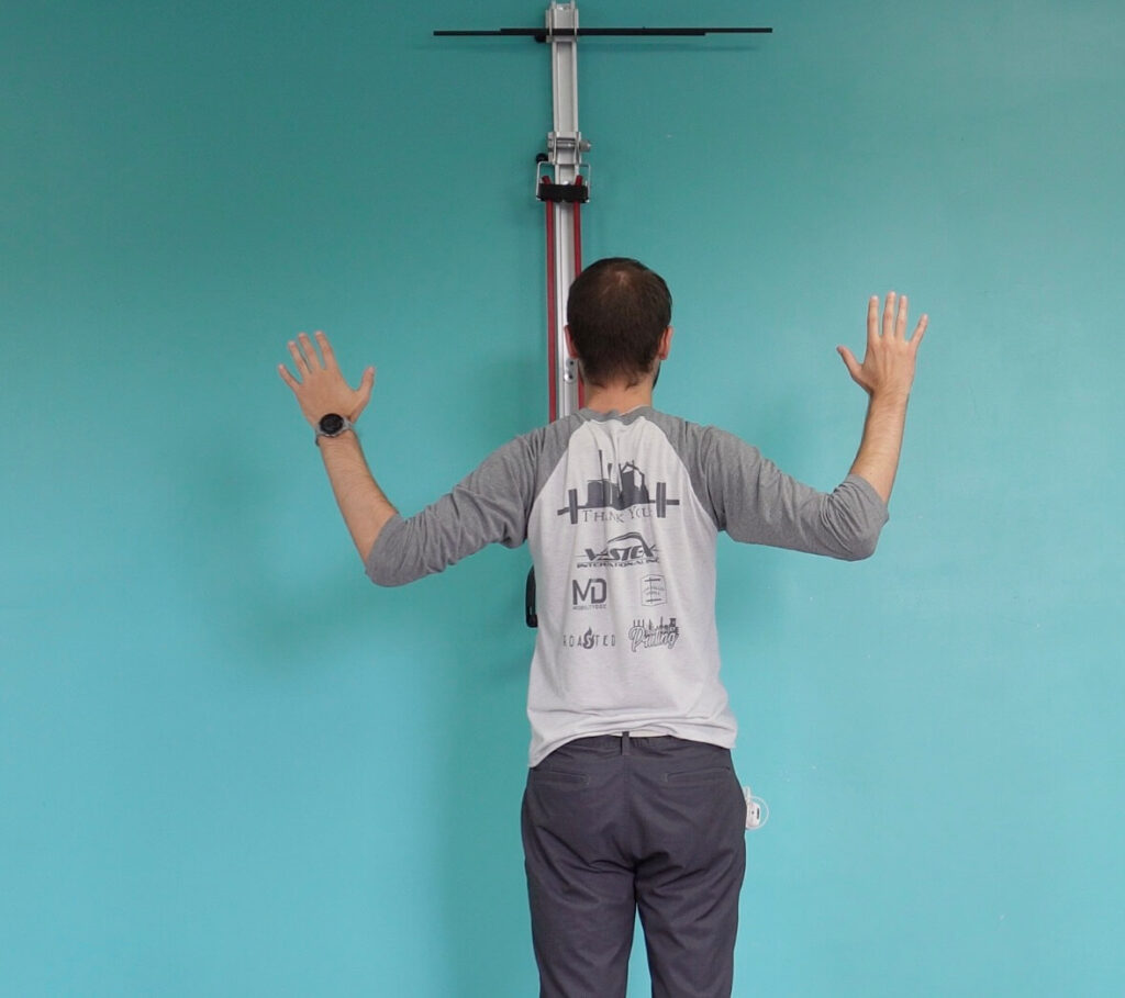 Dr. Jon demonstrating a W standing up