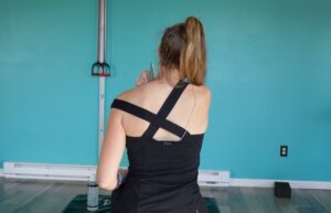 Dr. Chloe muscle scraping her lat for how to relieve shoulder pain at home.